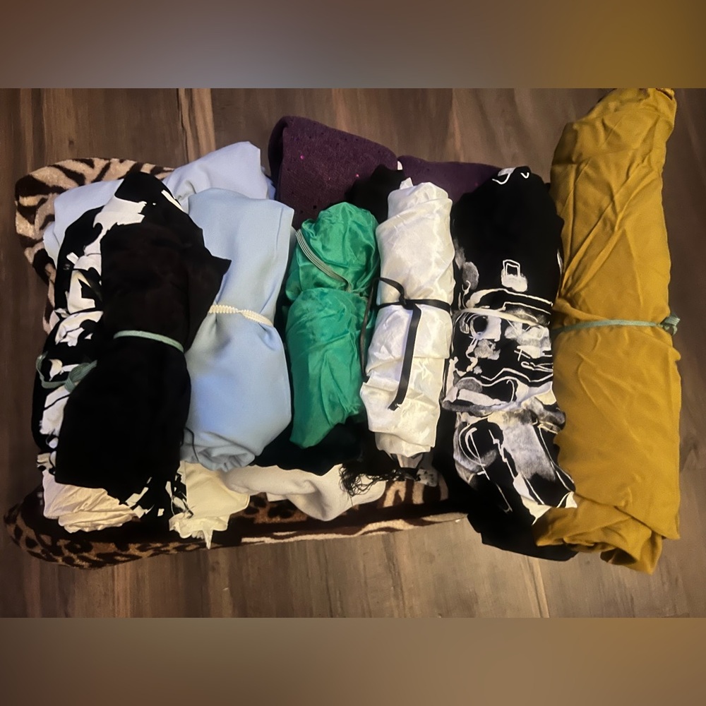 21 Rolls of fabric- Plain, Print, and Different Size